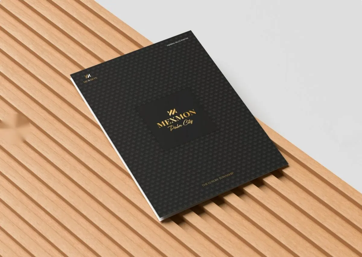 Mexmon brochure cover on a wooden slat surface